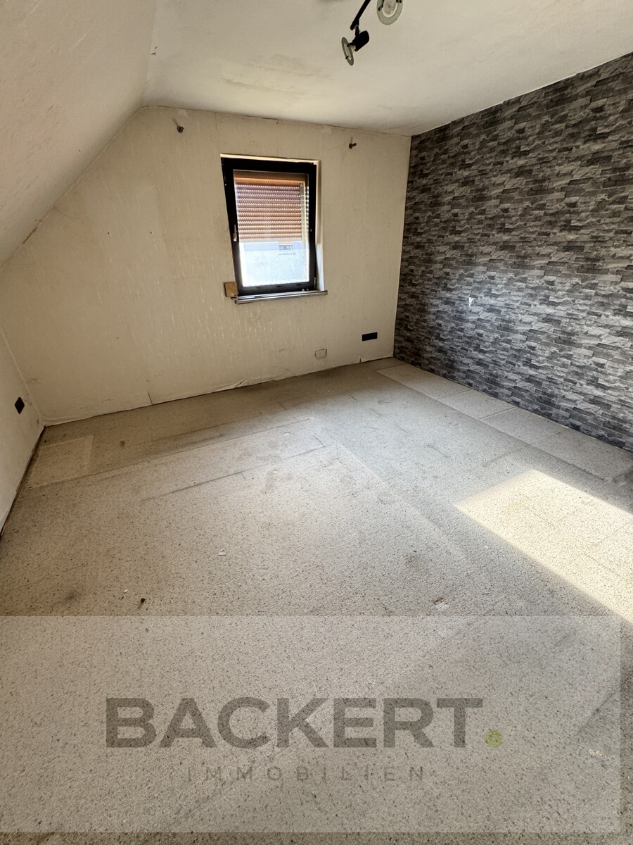 Schlafzimmer DG Zweifamilienhaus Untersteinach