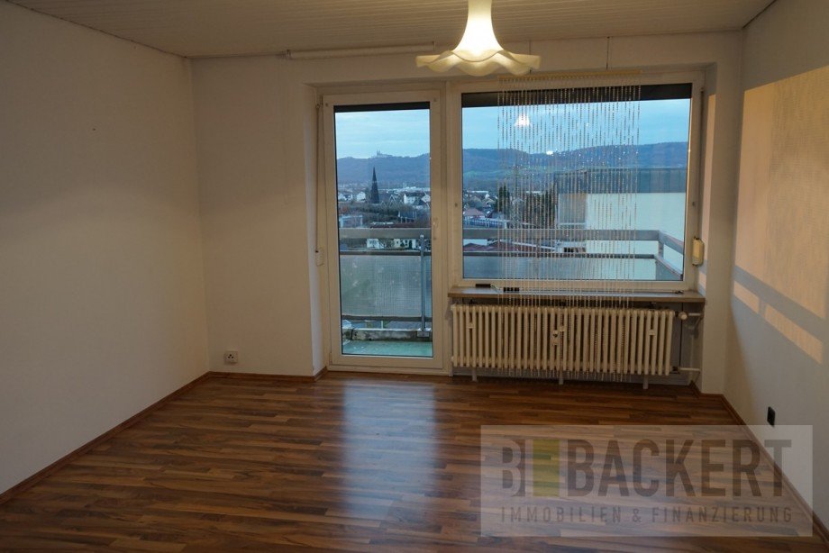 Wohnzimmer mit Zugang zum Balkon Penthousewohnung Lichtenfels