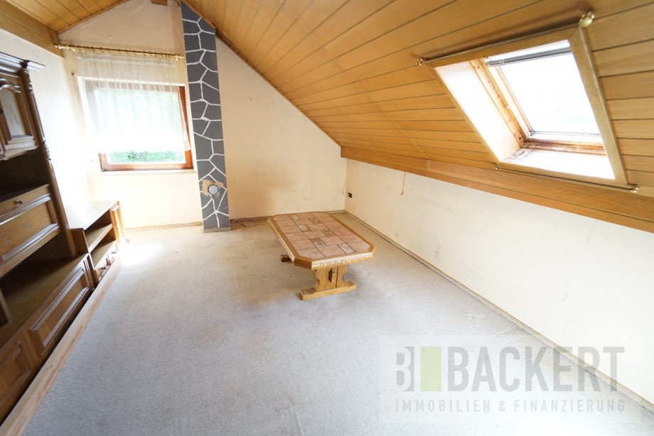 Wohnzimmer Dachgeschoss Einfamilienhaus Wallenfels